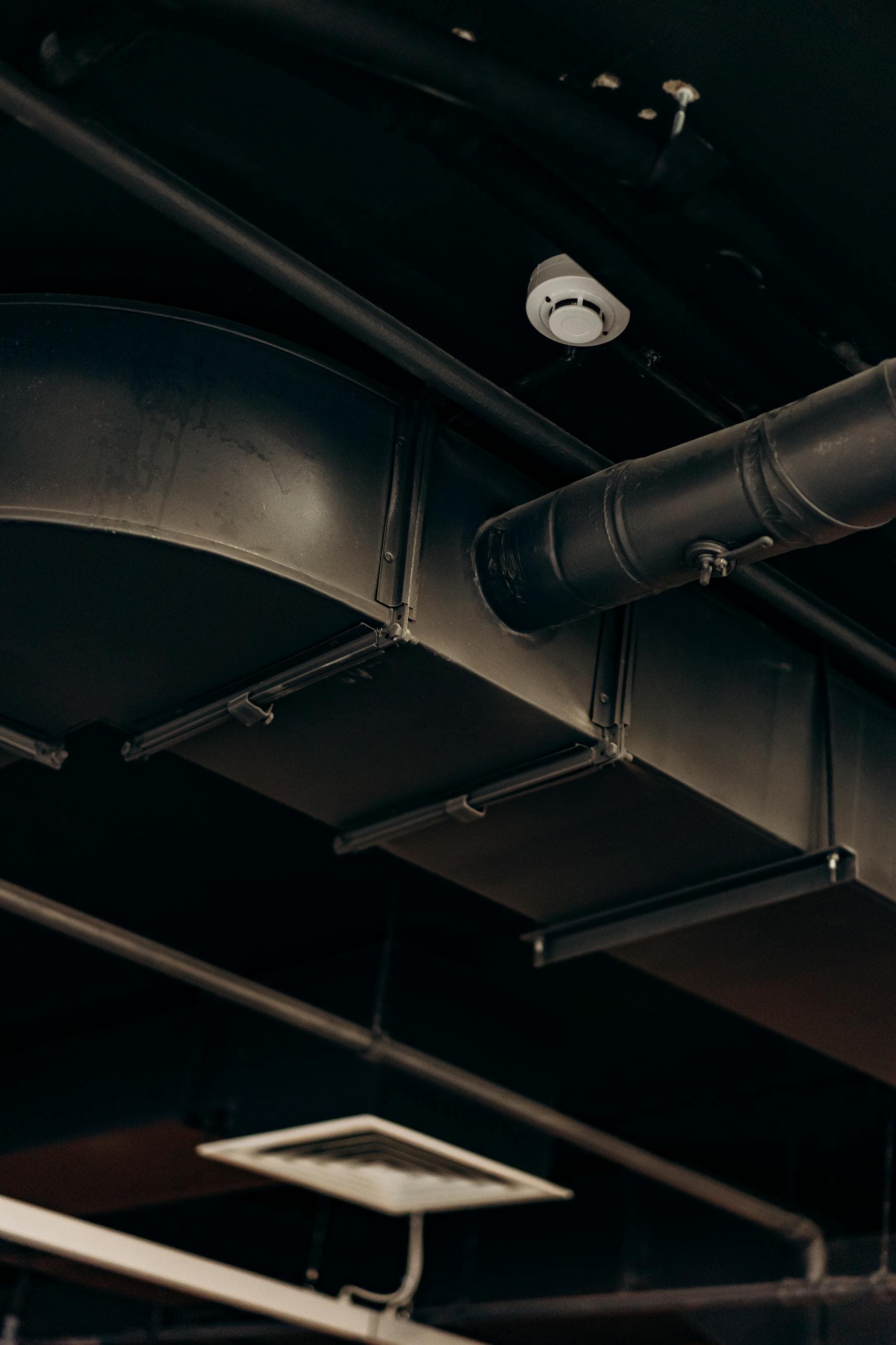 Exposed ductwork and ceiling ventilation