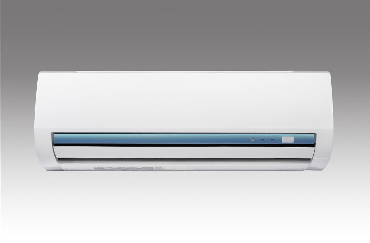 Wall-mounted ductless air conditioning unit